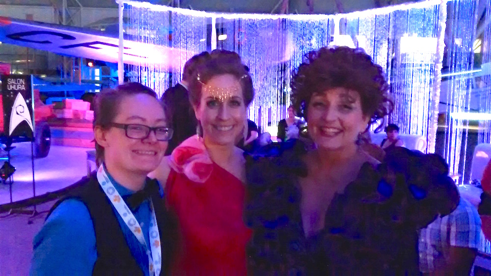 LtR: Mer Weinhold, Rebecca Bourke, and Roxane Kirkman (as Lwaxana Troi).