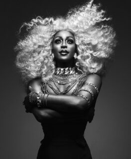 Black and white portrait of drag queen Tynomi Banks.